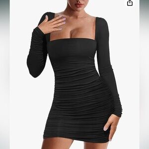 Black Long Sleeved Spandex Rouched Mini Dress With Crisscrossed Back